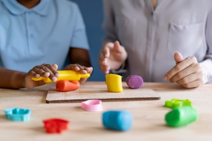 Child working with occupational therapist
